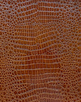 Tela de vinilo de cocodrilo marrón coñac 