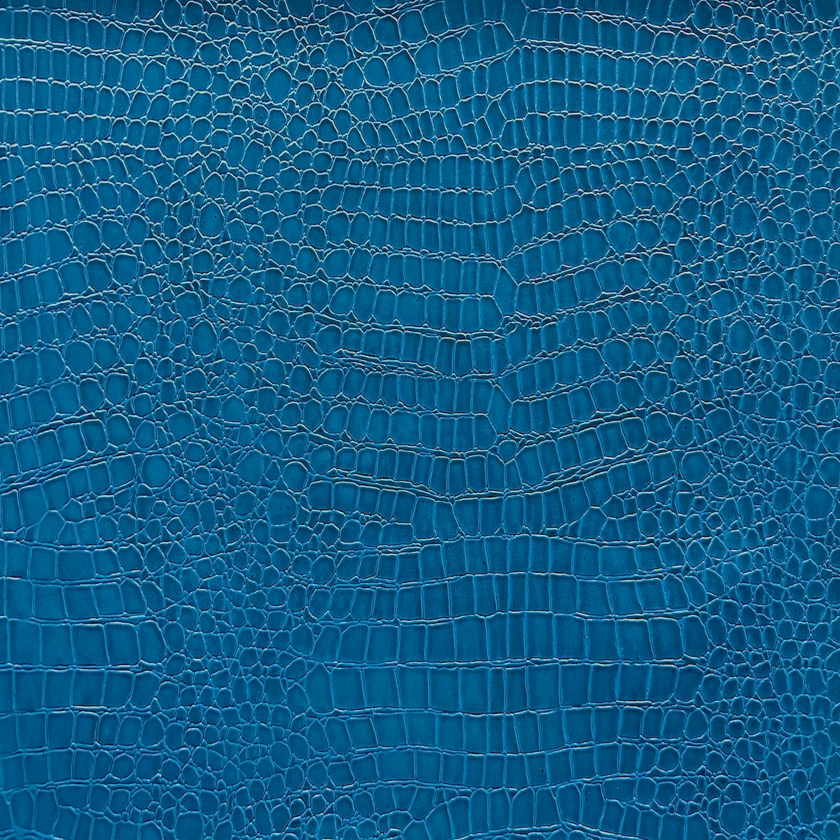 Tela de vinilo azul cobalto con cocodrilos 