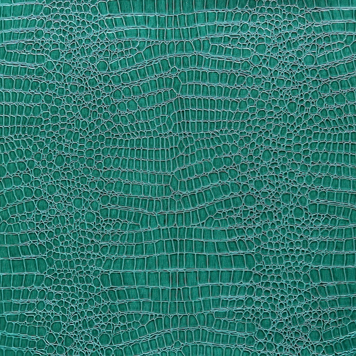 Tela de vinilo verde azulado con cocodrilos 
