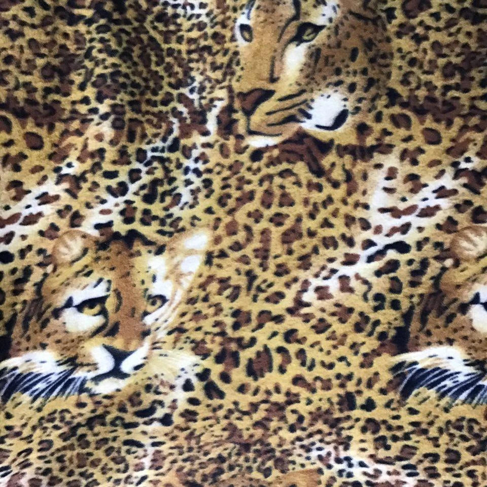 Leopard Face Print Fleece Fabric - Fashion Fabrics Los Angeles 