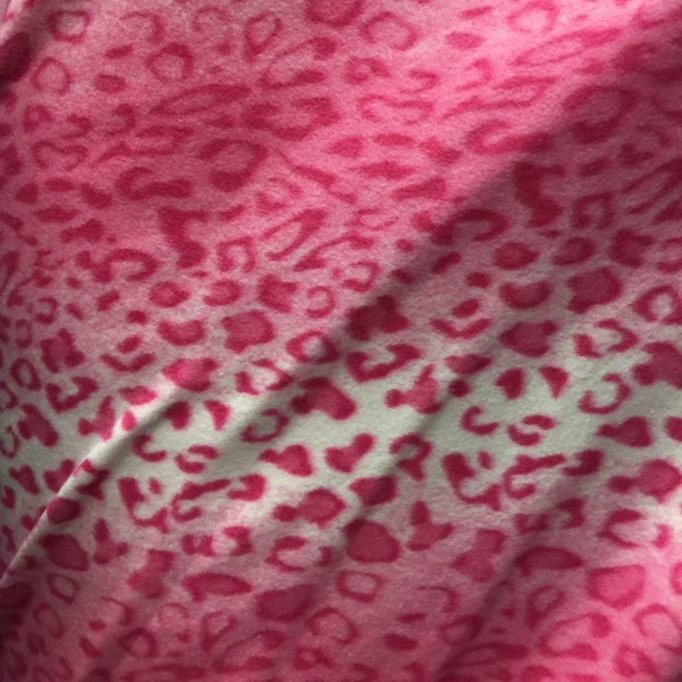Pink Snow Leopard Print Fleece Fabric - Fashion Fabrics Los Angeles 