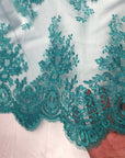 Teal Oswald Embroidered Lace Fabric - Fashion Fabrics LLC
