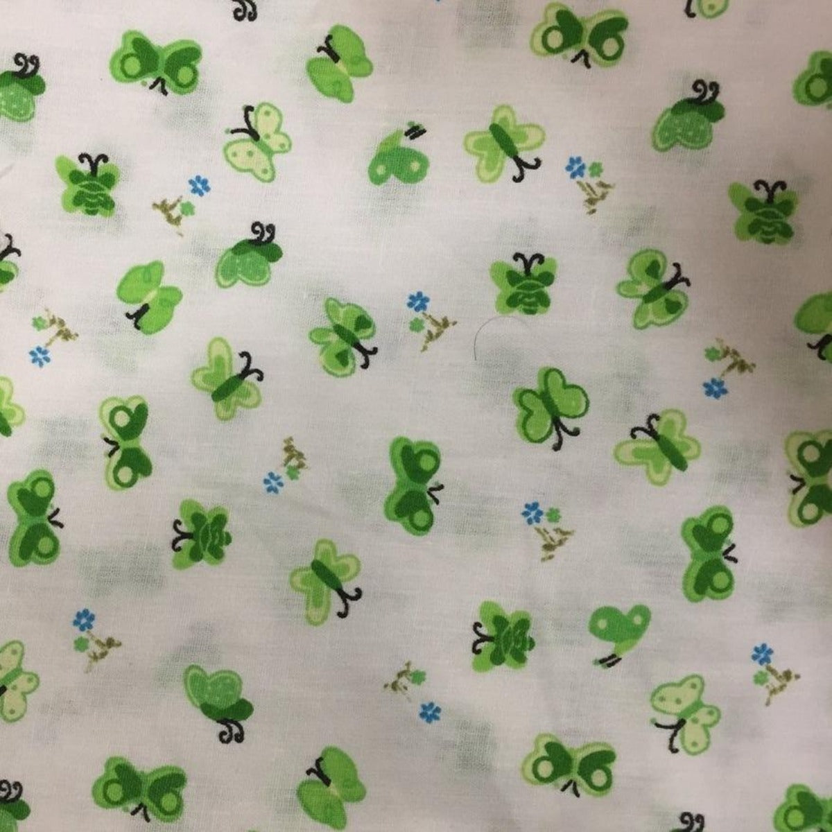 Green Butterfly Poly Cotton Print Fabric - Fashion Fabrics Los Angeles 
