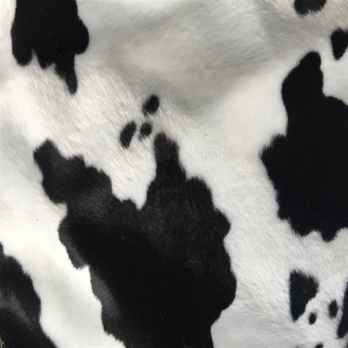 Black White Cow Velboa Faux Fur - Fashion Fabrics Los Angeles 
