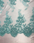 Mint Oswald Embroidered Lace Fabric - Fashion Fabrics LLC