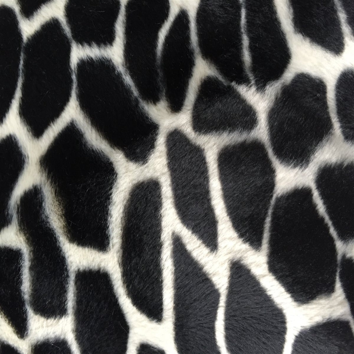 Black Giraffe Velboa Faux Fur - Fashion Fabrics Los Angeles 